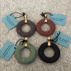 Charles Albert Volcanic Glass pendants